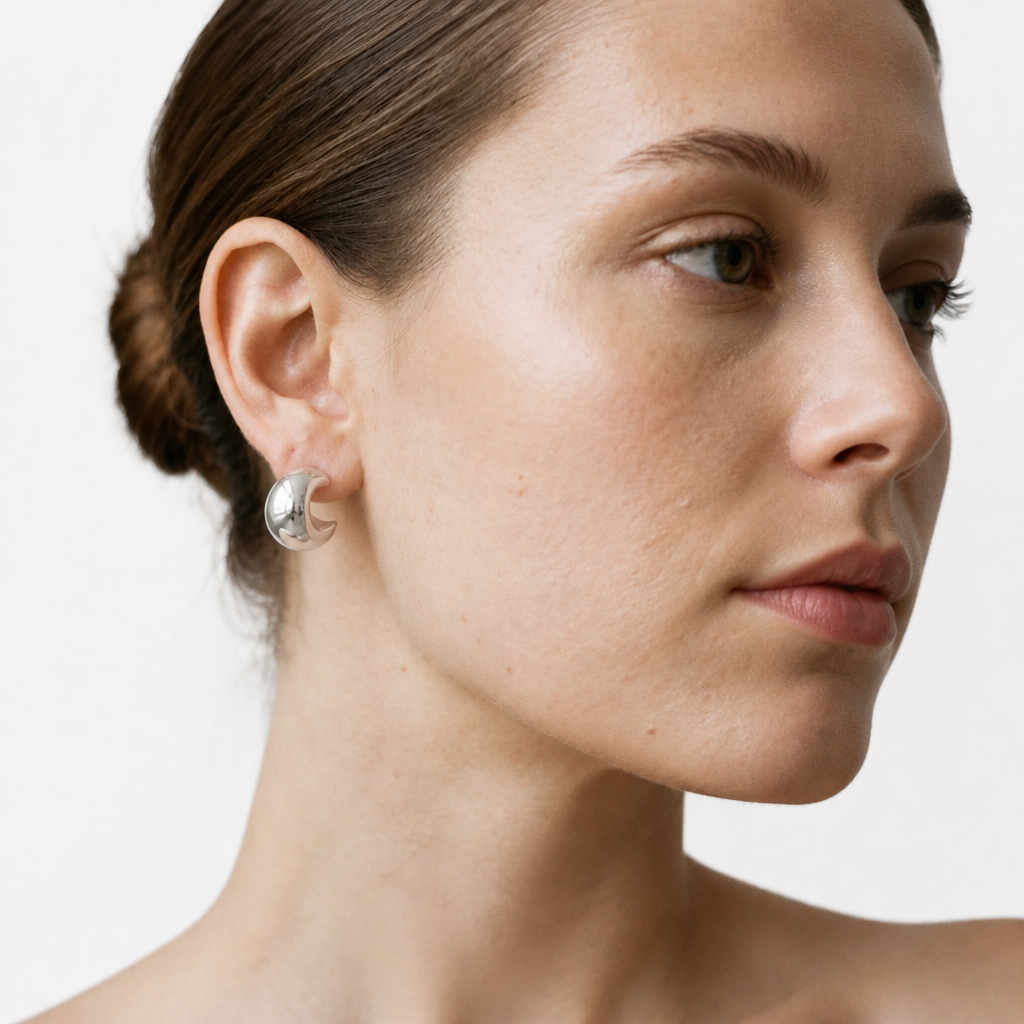 PENDIENTES DE ACERO PLATEADO ABOMBADOS