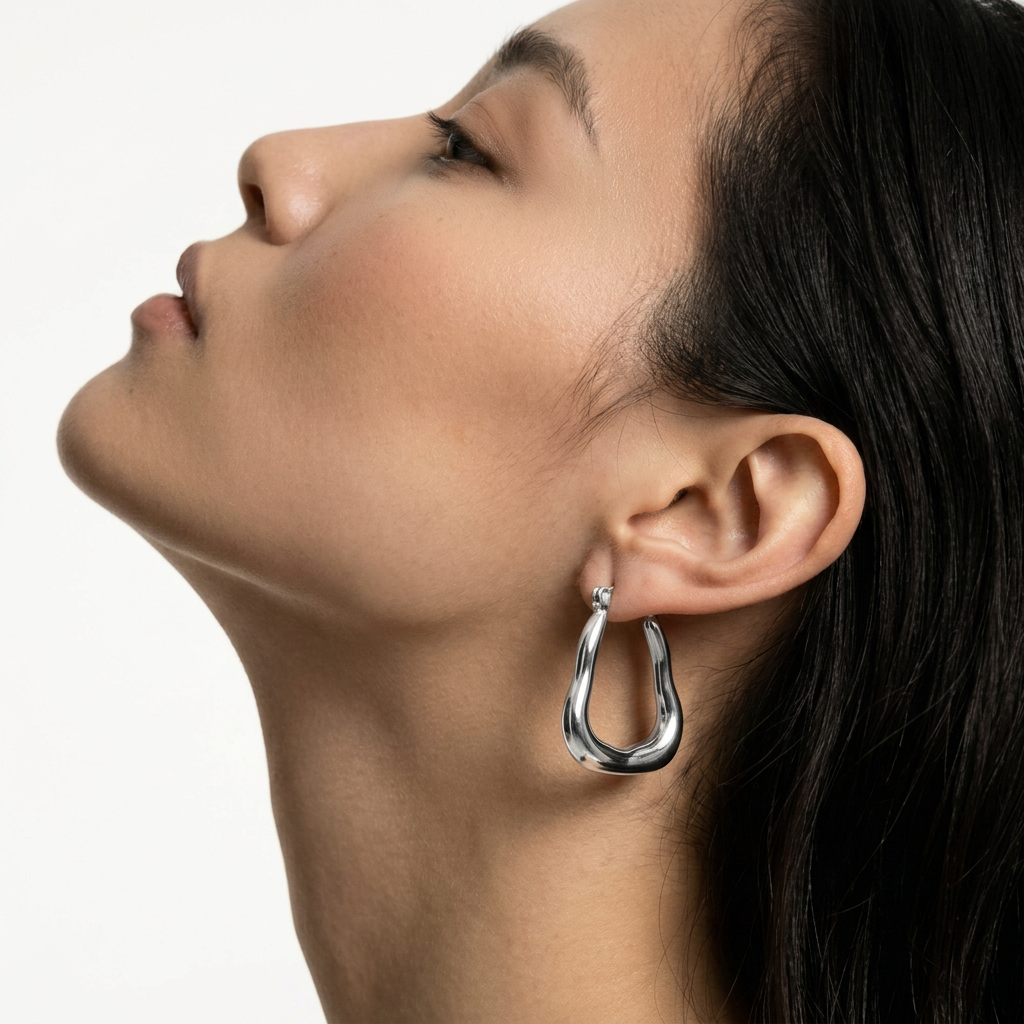 PENDIENTES DE ACERO PLATEADO AROS ORGÁNICOS