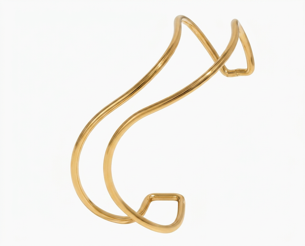 PULSERA DE ACERO DORADO CUFF ONDULADA